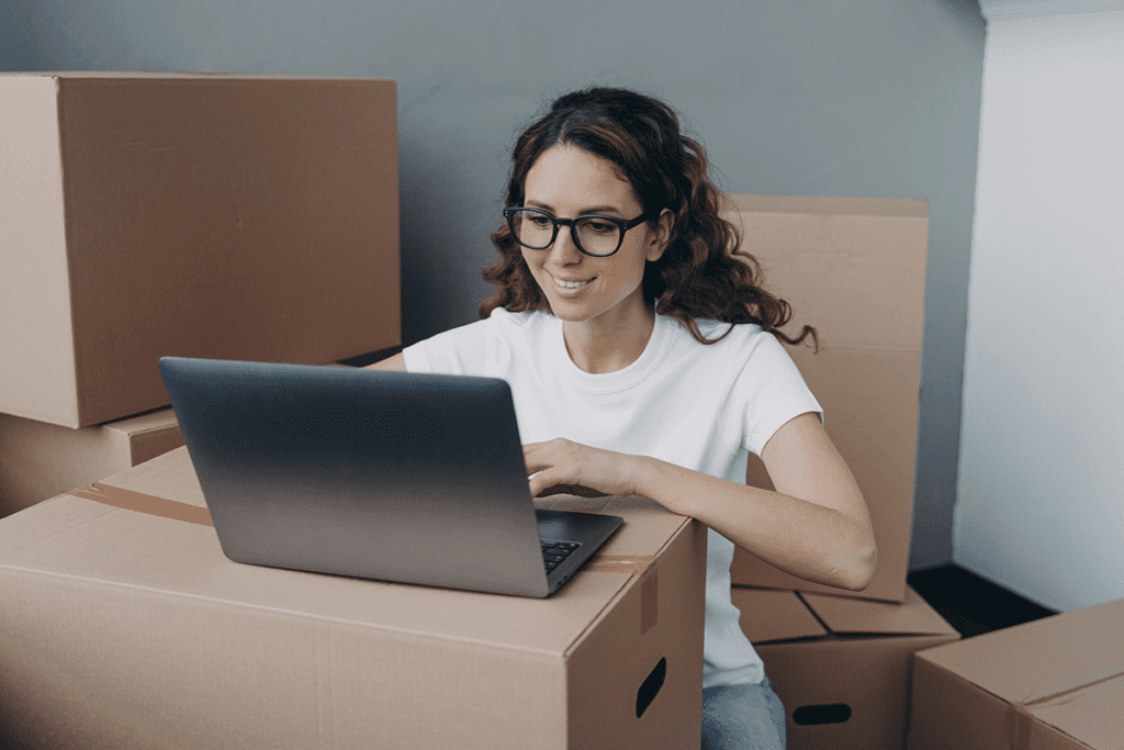 Woman searching for a moving company through digital marketing concept